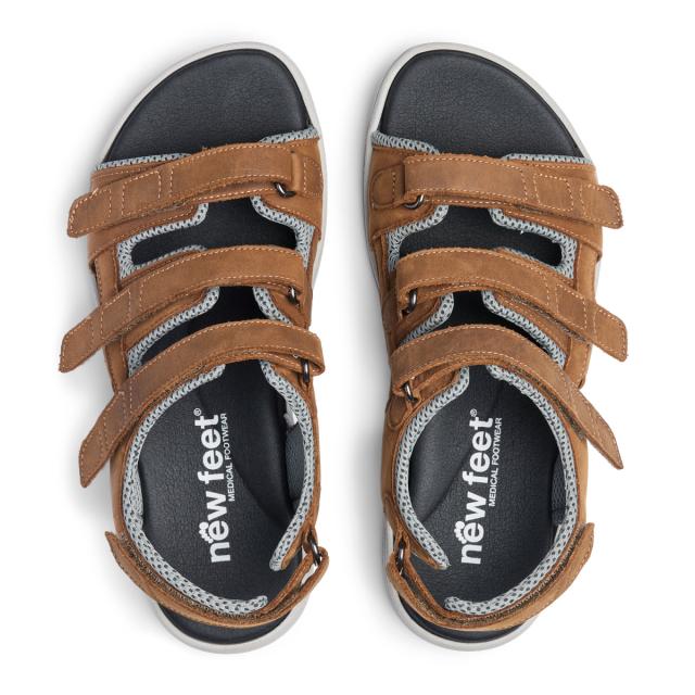 Sporty women´s sandal with adjustable heel strap and velcro straps for regulation