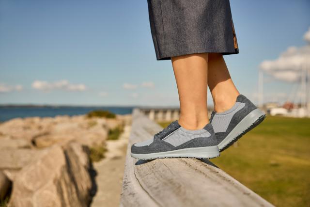 Sporty laced womens shoe with zipper