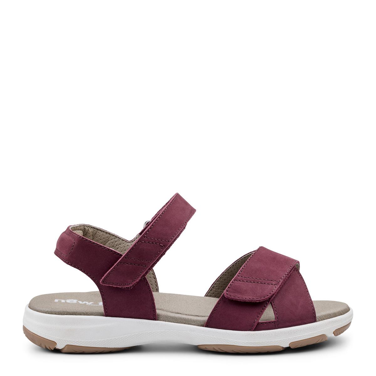 Women´s sandal with heel strap and two velcro straps