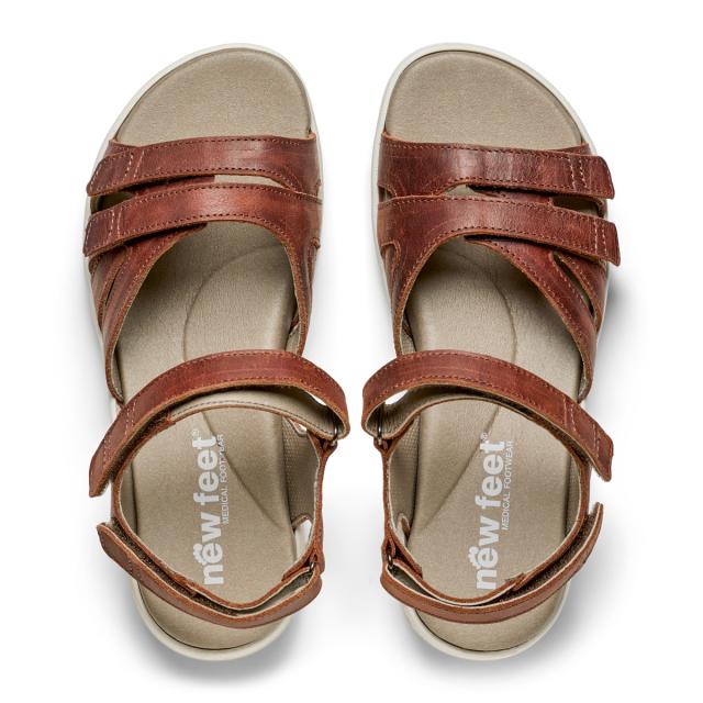 Women's sandal with an adjustable heel strap and three Velcro straps across the foot