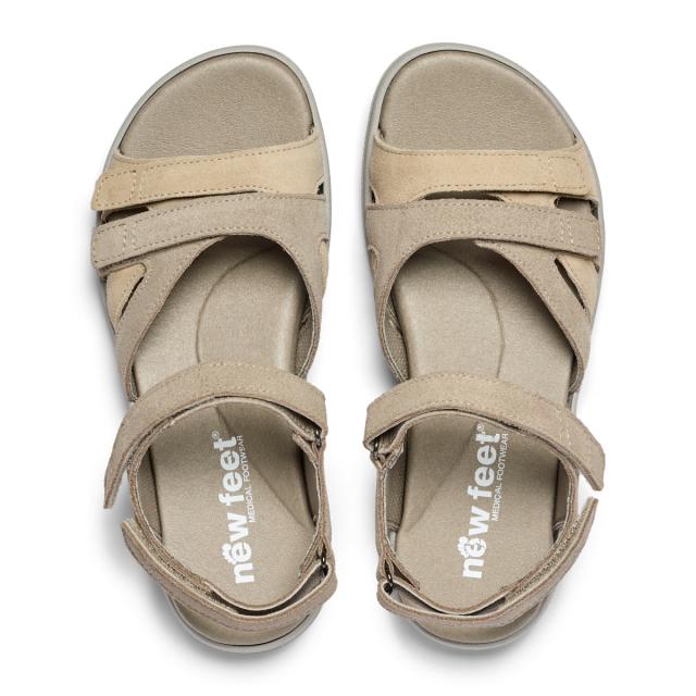 Women's sandal with an adjustable heel strap and three Velcro straps across the foot