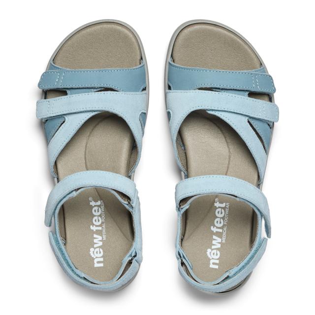 Women's sandal with an adjustable heel strap and three Velcro straps across the foot