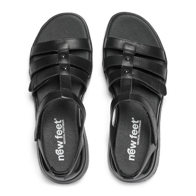 Women´s sandal with semi-open heel cap and two velcro straps