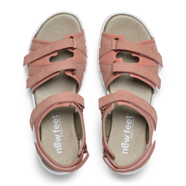 Sandal with three adjustable straps across the foot and one adjustable heel strap