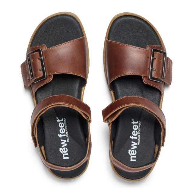 Women´s sandal with adjustable velcro straps and a buckle