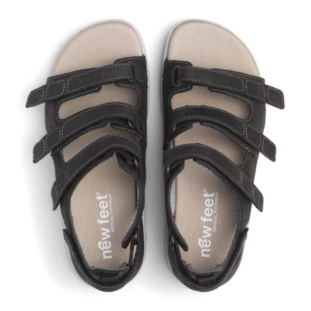 Sandal for women with adjustable velcro straps and half-open heel cap